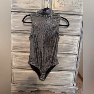 Silver bodysuit.